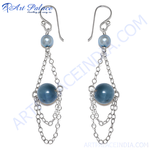 Load image into Gallery viewer, Sterling silver drop earrings with blue gemstone beads, a beautiful and elegant jewelry design.
