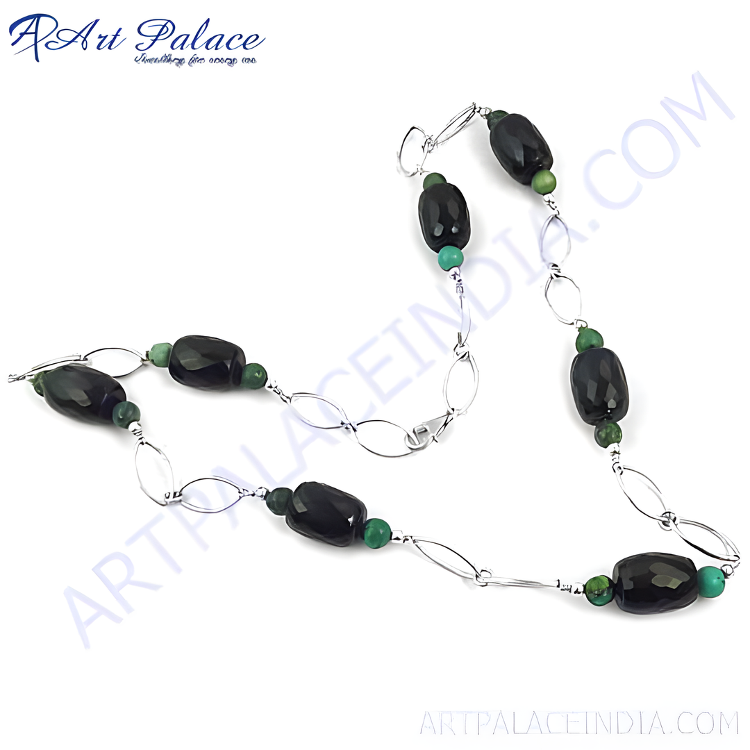 Sterling silver beaded necklace featuring faceted black onyx and green beads.