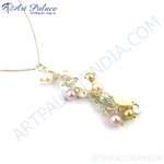 Load image into Gallery viewer, Gold chain necklace with a cluster of pearls in pink, white, and gold.
