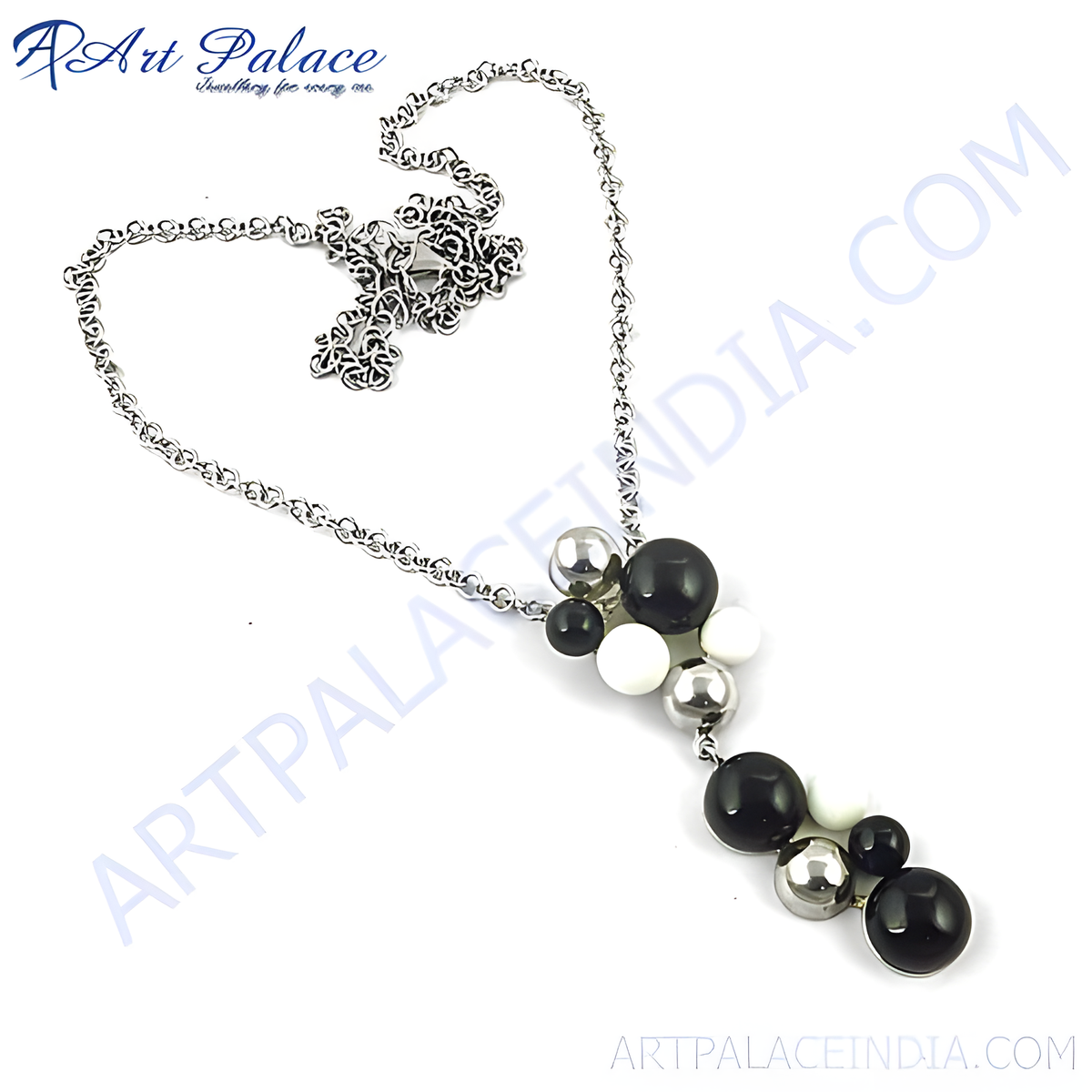 Silver pendant necklace with black, white, and silver beads