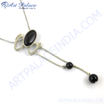 Load image into Gallery viewer, Silver pendant necklace with a large black onyx gemstone and dangling onyx beads.
