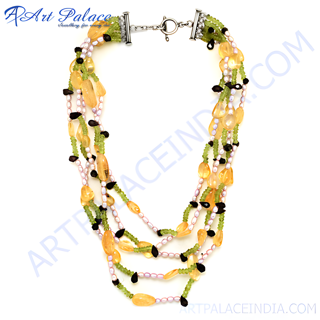 Multi-strand necklace with citrine, peridot, and black onyx beads, freshwater pearls, and silver clasp.