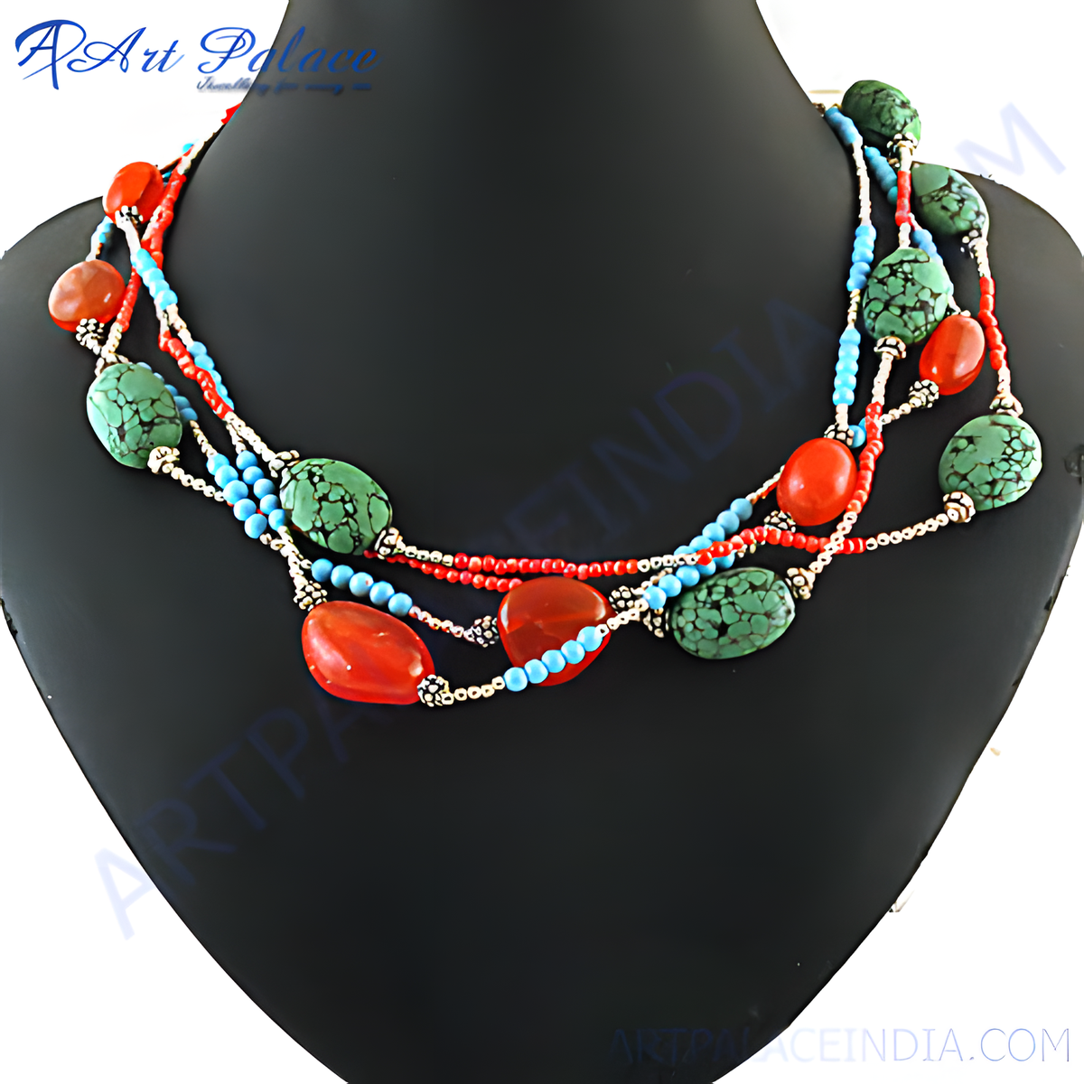 Multi strand necklace featuring carnelian, turquoise and blue beads on a black mannequin