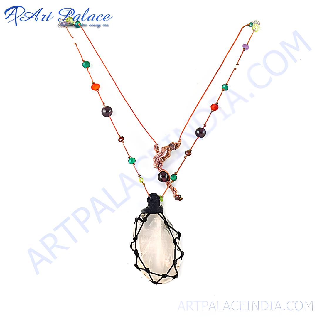 A unique gemstone pendant necklace with black cord. The necklace is a boho style with colorful beads.