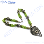 Load image into Gallery viewer, Silver heart pendant necklace with green beaded strands, perfect for women.
