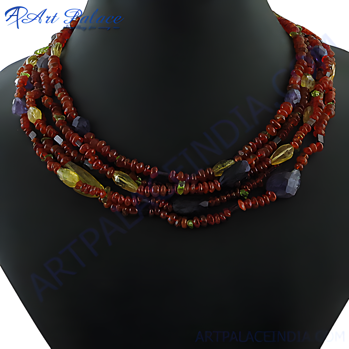 Multi strand carnelian bead necklace with colorful gemstone accents on black mannequin