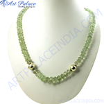 Load image into Gallery viewer, Green prehnite beaded necklace displayed on a white bust, showing the gemstone necklace&#39;s details and design.
