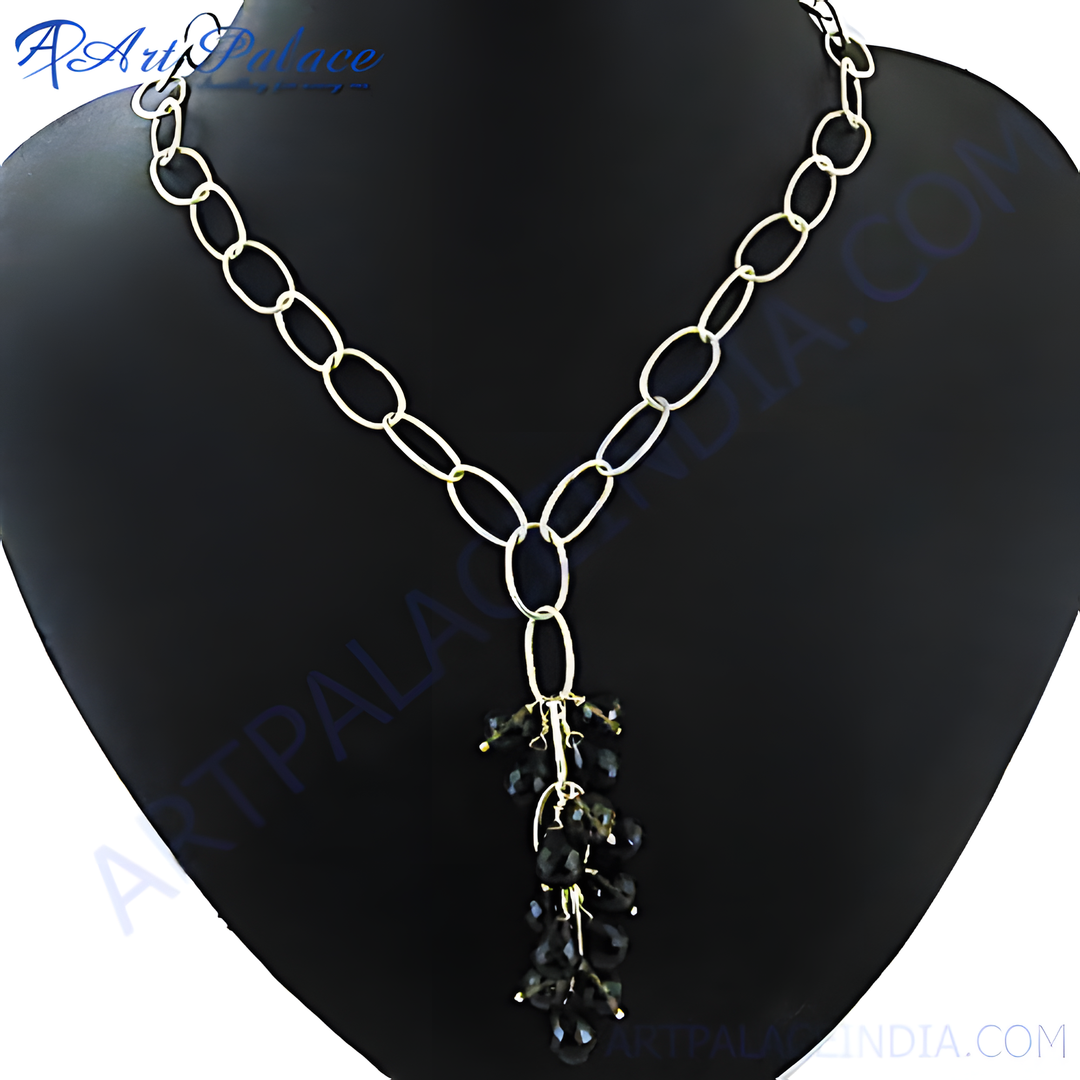 Silver necklace with a black gemstone pendant, elegant and stylish jewelry for women.