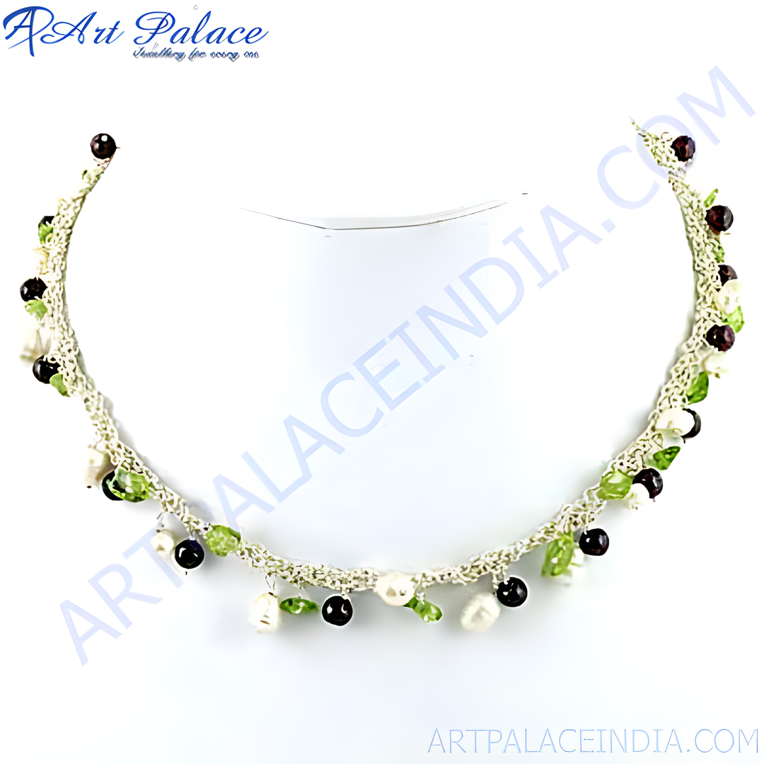 A handcrafted necklace featuring pearls, and gemstones, with a crochet design.