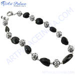 Load image into Gallery viewer, Sterling silver bracelet with black onyx beads, a stylish and elegant accessory for women.
