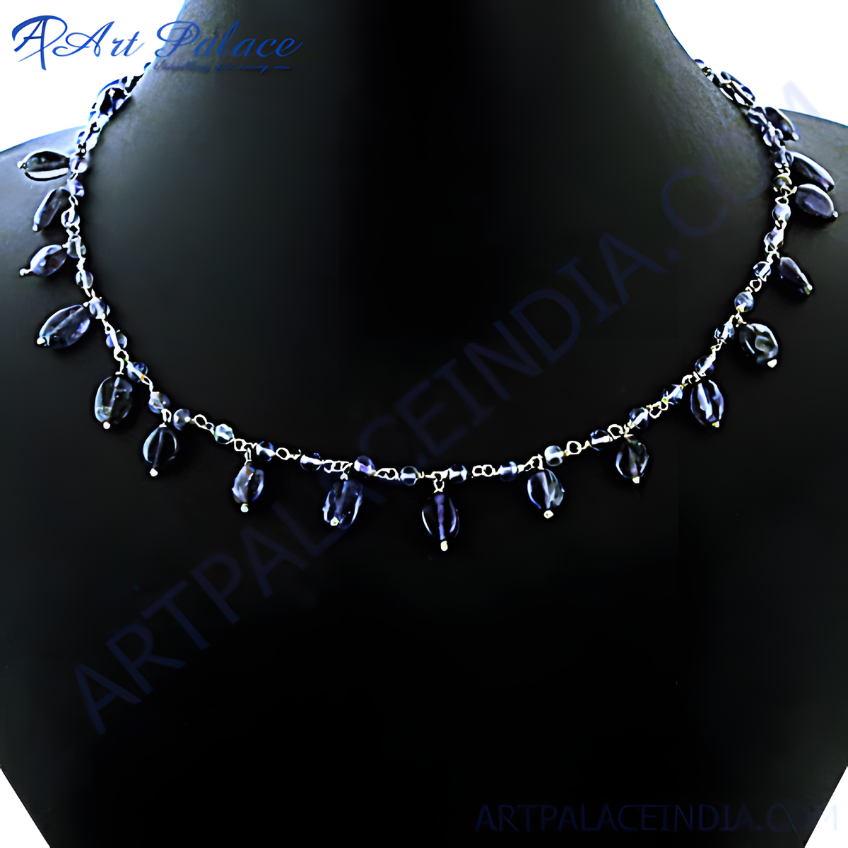 Silver gemstone beaded necklace on a black background
