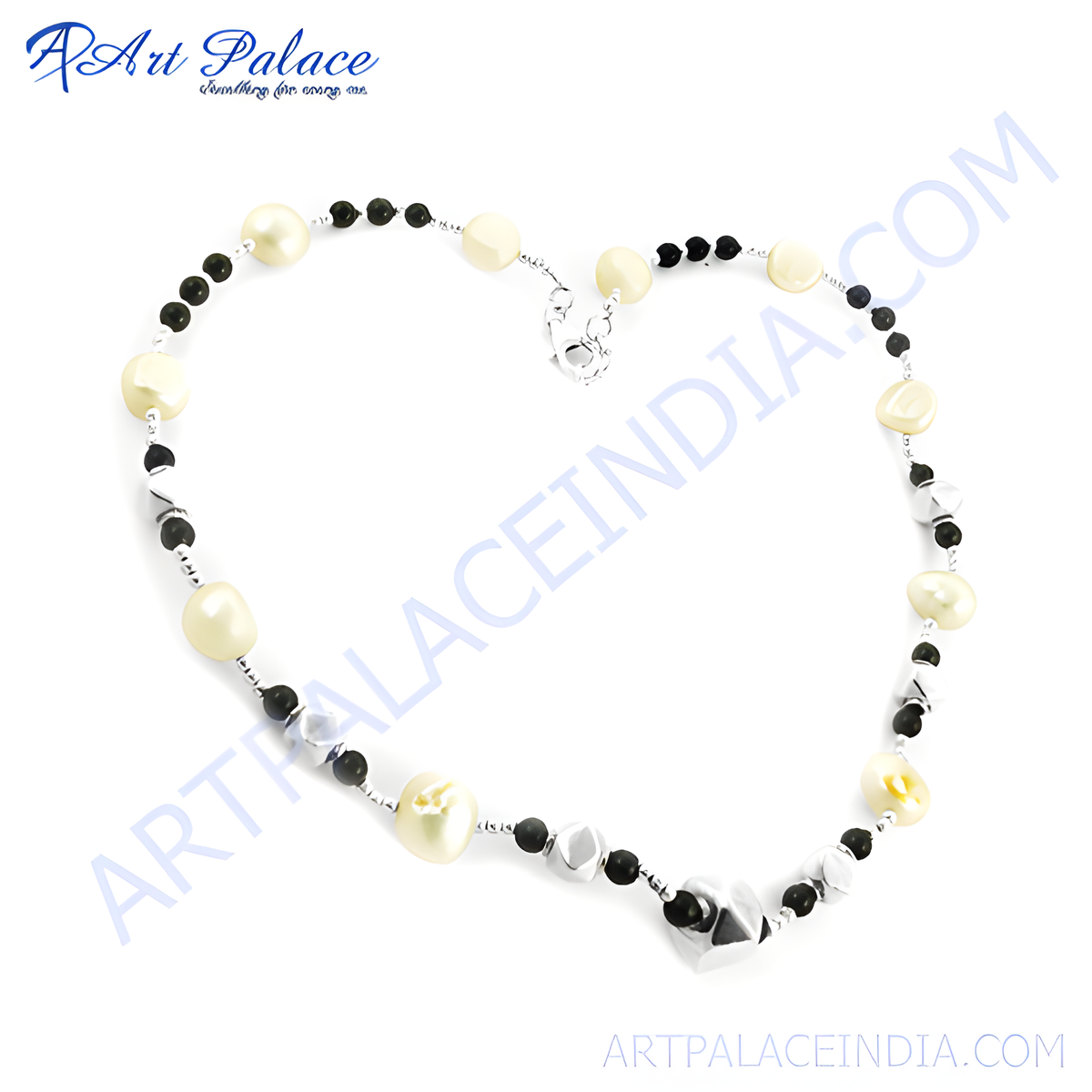 Sterling silver beaded necklace with white pearls, black onyx beads, and a silver clasp
