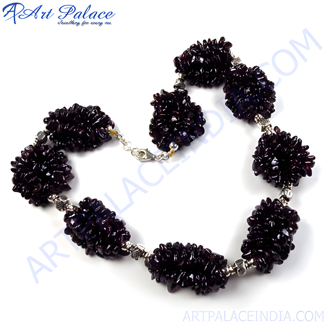 Garnet bead cluster necklace with sterling silver accents, featuring dark red gemstones.