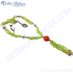 Load image into Gallery viewer, Green beaded necklace with a red stone pendant, perfect for adding a pop of color and style.

