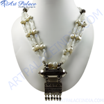 Load image into Gallery viewer, Elegant silver and pearl beaded necklace displayed on a mannequin
