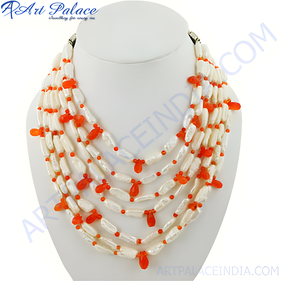 Multi-strand pearl and coral statement necklace on a white display. Features natural pearls and coral accents.