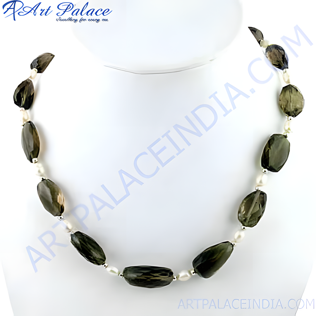 Smoky quartz and pearl beaded necklace on a white background. Dark gray gemstone beads and white pearl beads.