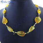 Load image into Gallery viewer, Yellow citrine bead necklace displayed on a dark blue background, gemstone jewelry.

