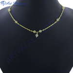 Load image into Gallery viewer, Gold beaded chain necklace on a black mannequin. The necklace features small gold beads along the chain, offering a delicate look.
