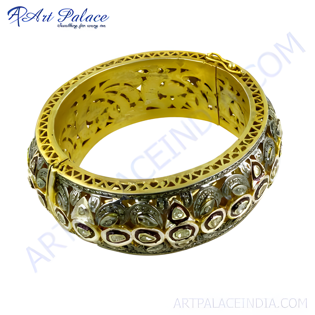 Gold filigree bangle bracelet with diamonds, a luxurious piece of jewelry for women.