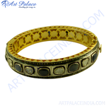 Load image into Gallery viewer, Gold bangle bracelet with black and white gemstones, luxury women&#39;s jewelry.
