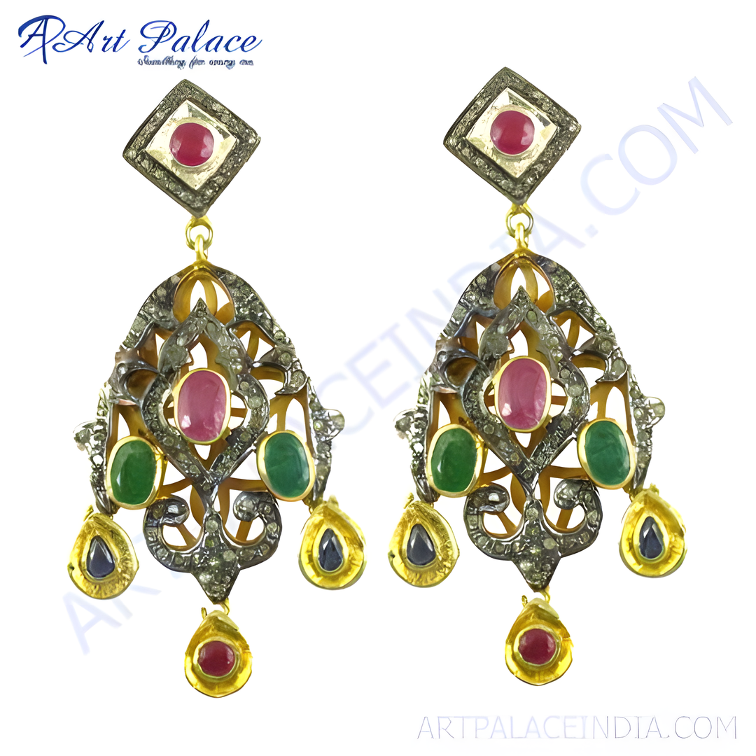 Gold filigree dangle earrings featuring ruby, emerald, and diamond gemstones.