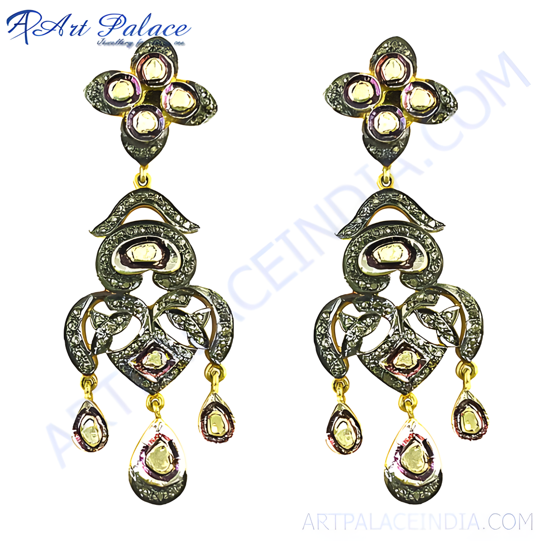 Antique diamond dangle earrings in gold and black, featuring unique gemstone accents and an elegant art deco design.