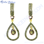 Load image into Gallery viewer, Gold teardrop dangle earrings with a central gemstone and encrusted accents, perfect for women.
