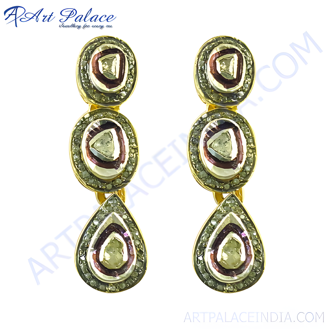 Gold teardrop earrings with a brown and white colored center stones with smaller diamond accents, a luxurious earring design