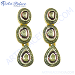 Load image into Gallery viewer, Gold teardrop earrings with a brown and white colored center stones with smaller diamond accents, a luxurious earring design
