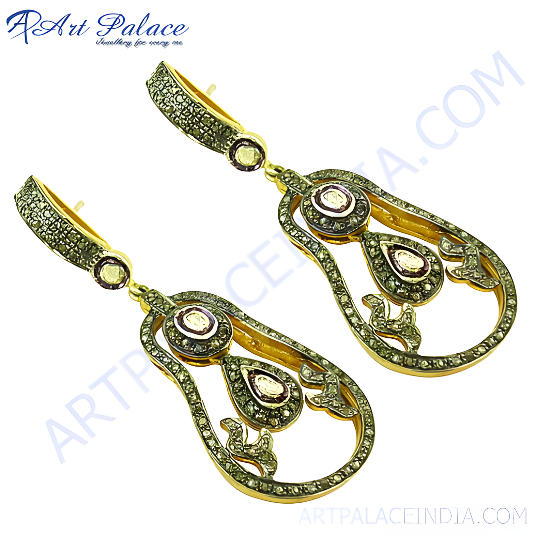 Gold teardrop earrings featuring sparkling diamonds, perfect for a touch of elegance.