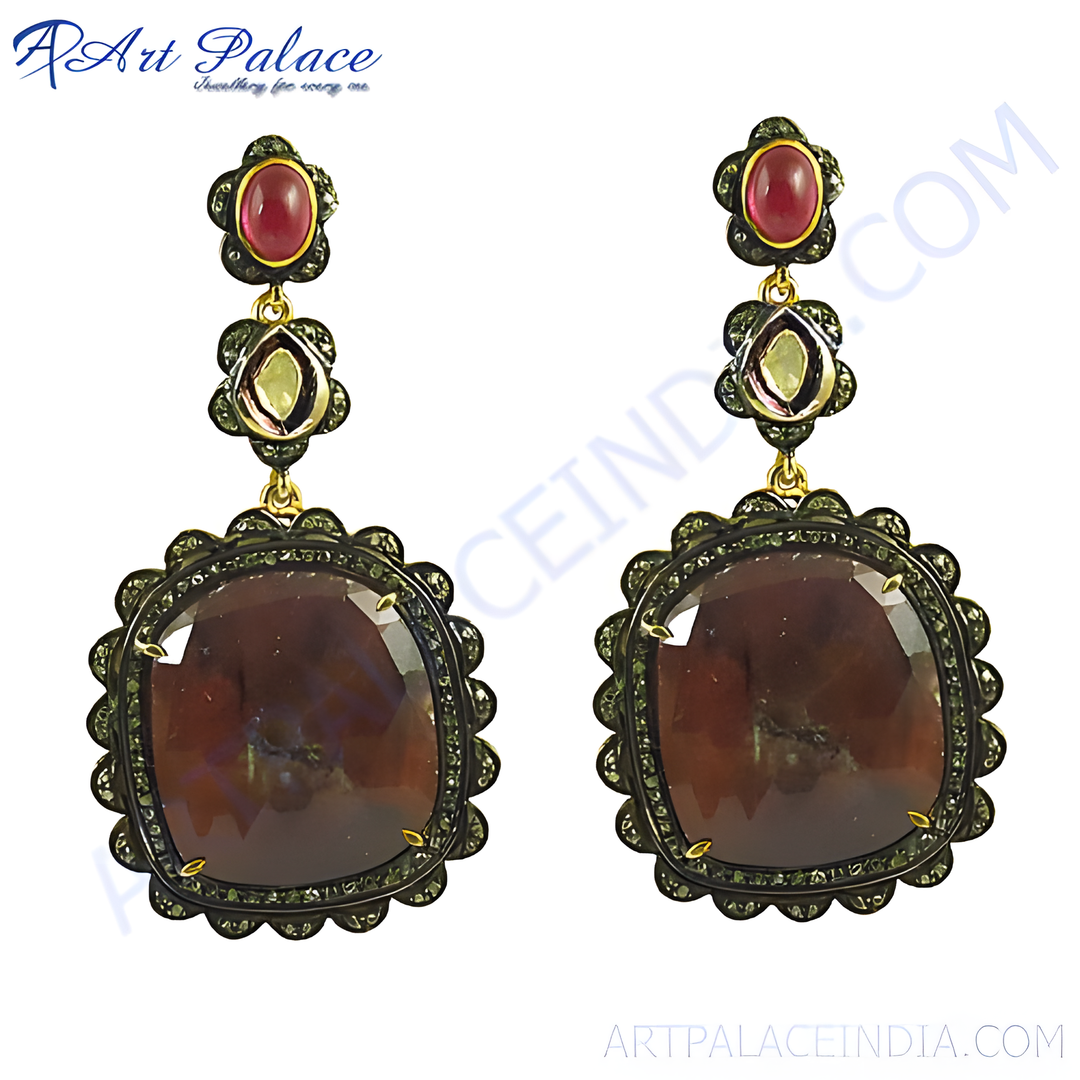 Ruby and sapphire gemstone dangle earrings with intricate detailing, ideal for women