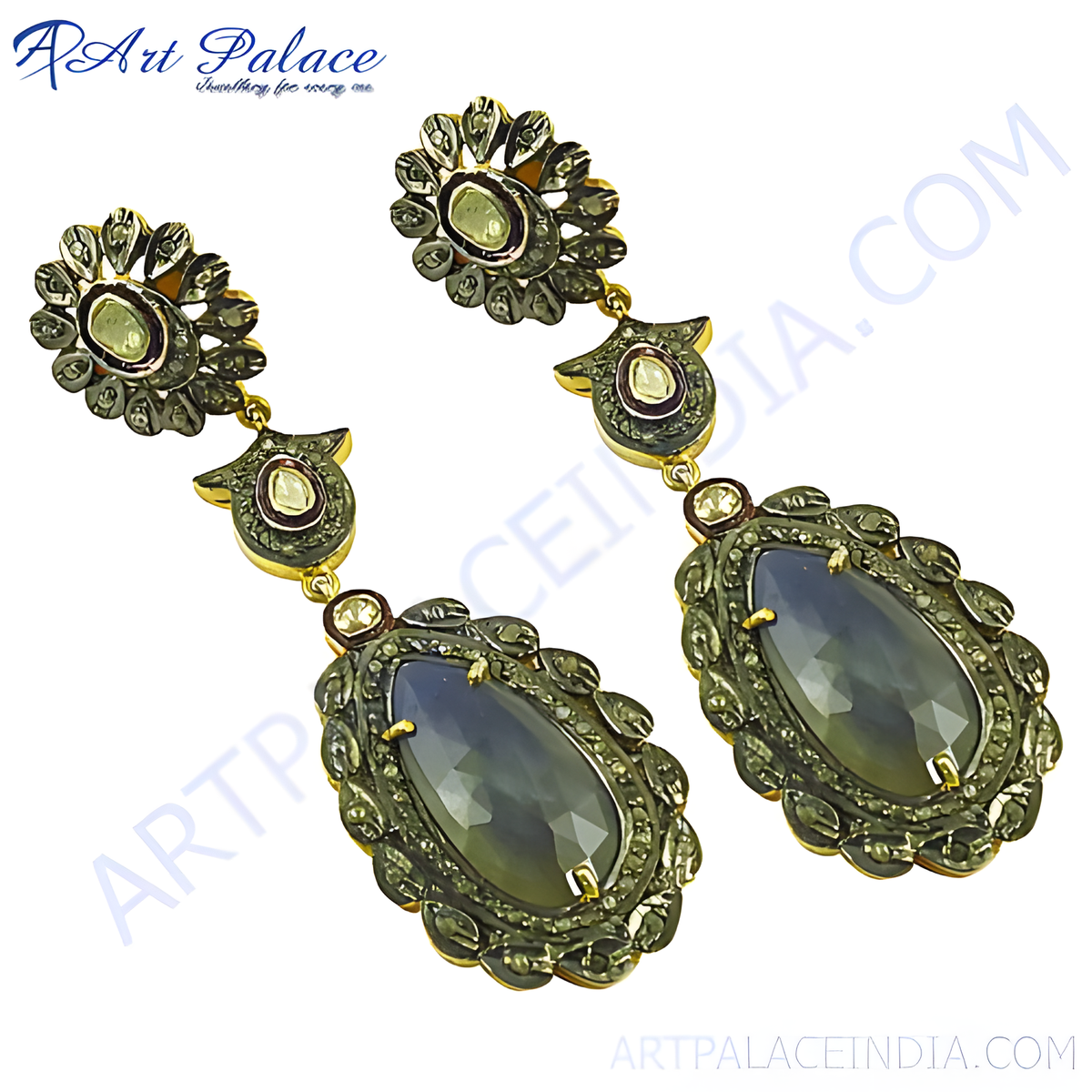 Antique style gemstone drop earrings with detailed metalwork, featuring a central gemstone