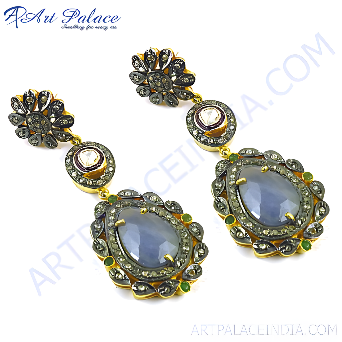 Gold drop earrings featuring sapphire gemstones with intricate detailing