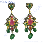 Load image into Gallery viewer, Gold plated drop earrings with emerald and ruby gemstones, a luxurious and elegant jewelry piece for women.

