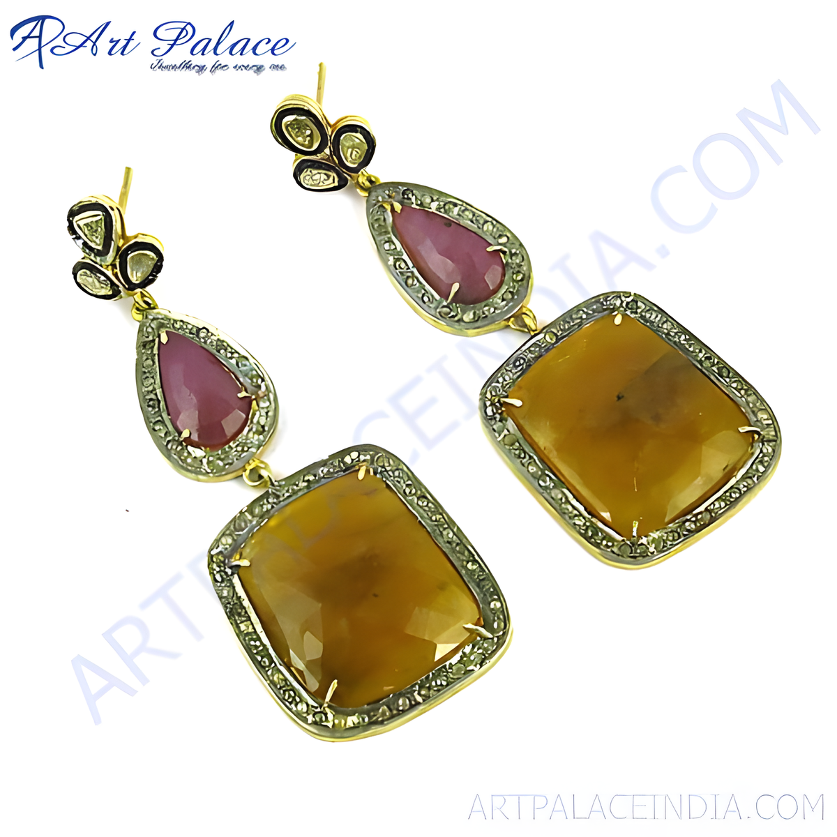 Gold drop earrings featuring ruby and sapphire gemstones