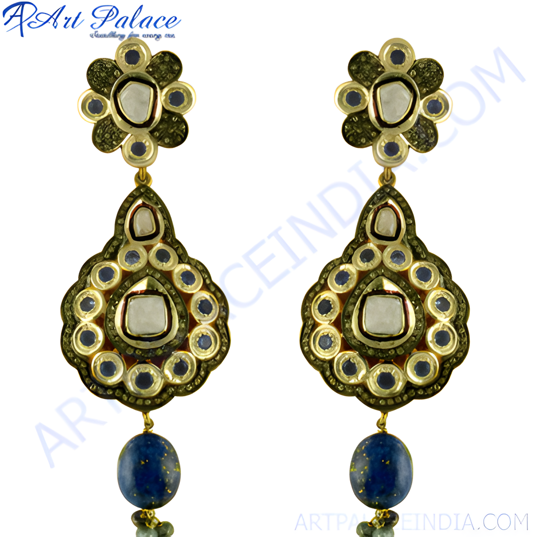 Gold-tone dangle earrings with white gemstone accents and a vibrant blue Lapis Lazuli gemstone drop.