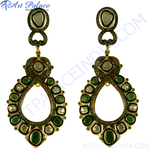 Load image into Gallery viewer, Elegant drop earrings featuring emerald and diamond gemstones, set in a gold metal base, a perfect statement jewelry piece.
