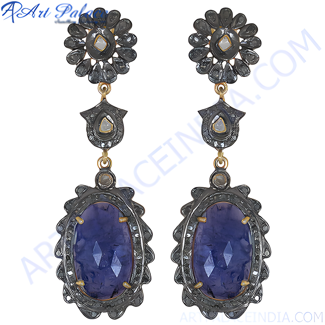 Sapphire drop earrings featuring dark metal with blue sapphire gemstones, designed for women's ears