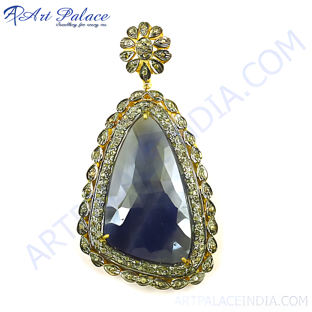 Antique gold finish sapphire pendant necklace with intricate detailing, blue gemstone center.