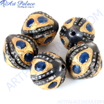 Load image into Gallery viewer, Oxidized silver beads with gold accents and blue sapphire gemstones, perfect for jewelry making.
