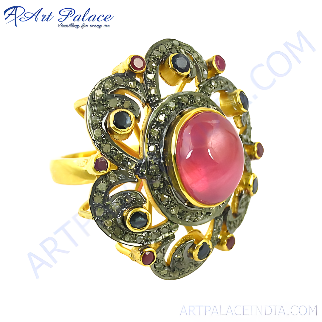 gold plating ruby and diamond cocktail ring, featuring a large pink ruby gemstone and surrounding diamonds.