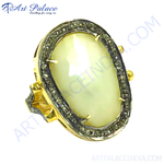 Load image into Gallery viewer, gold plating ring with a large oval pearl center stone and diamond accents around the bezel, a beautiful piece of jewelry
