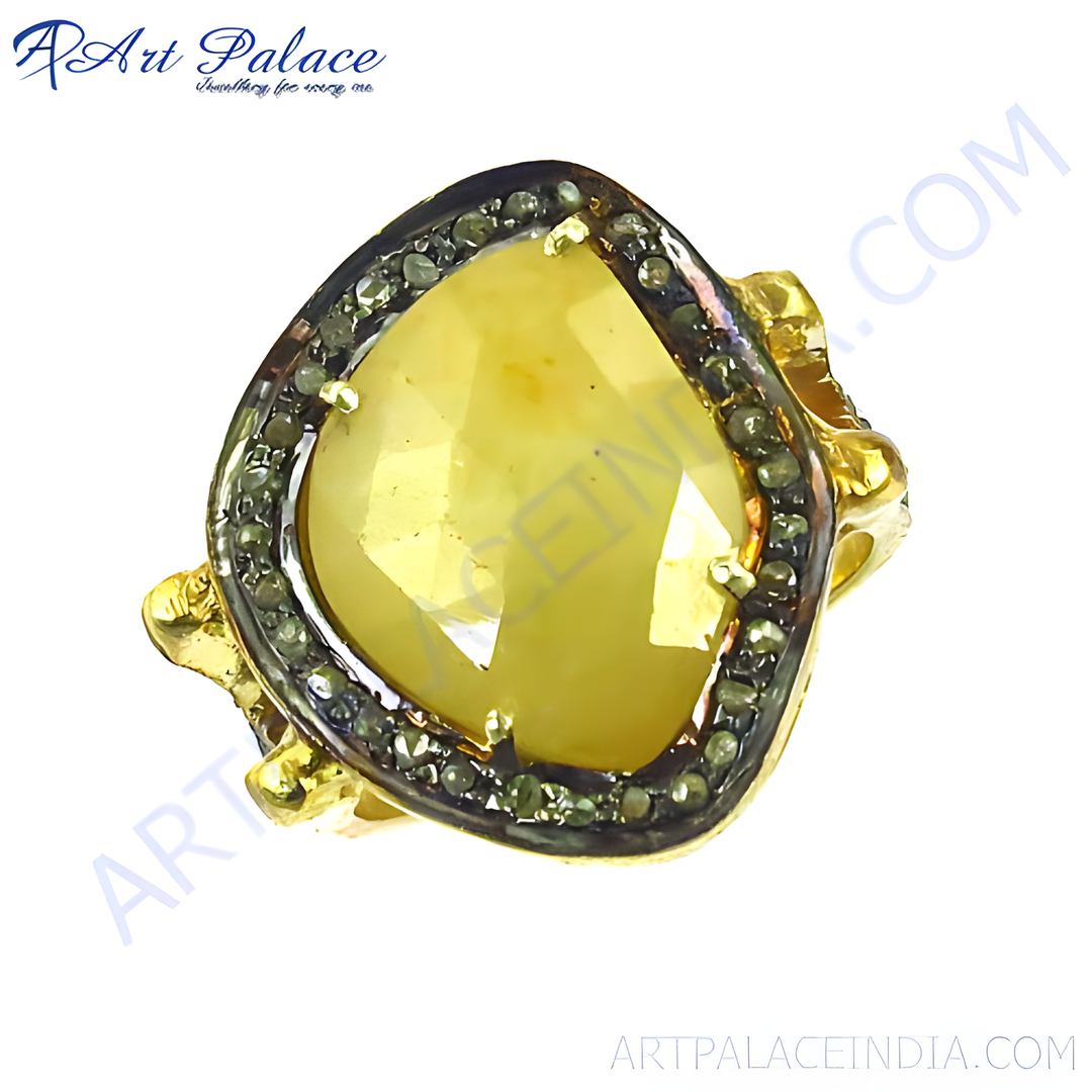 Gold ring with a large yellow sapphire center stone and diamond accents around the edge.