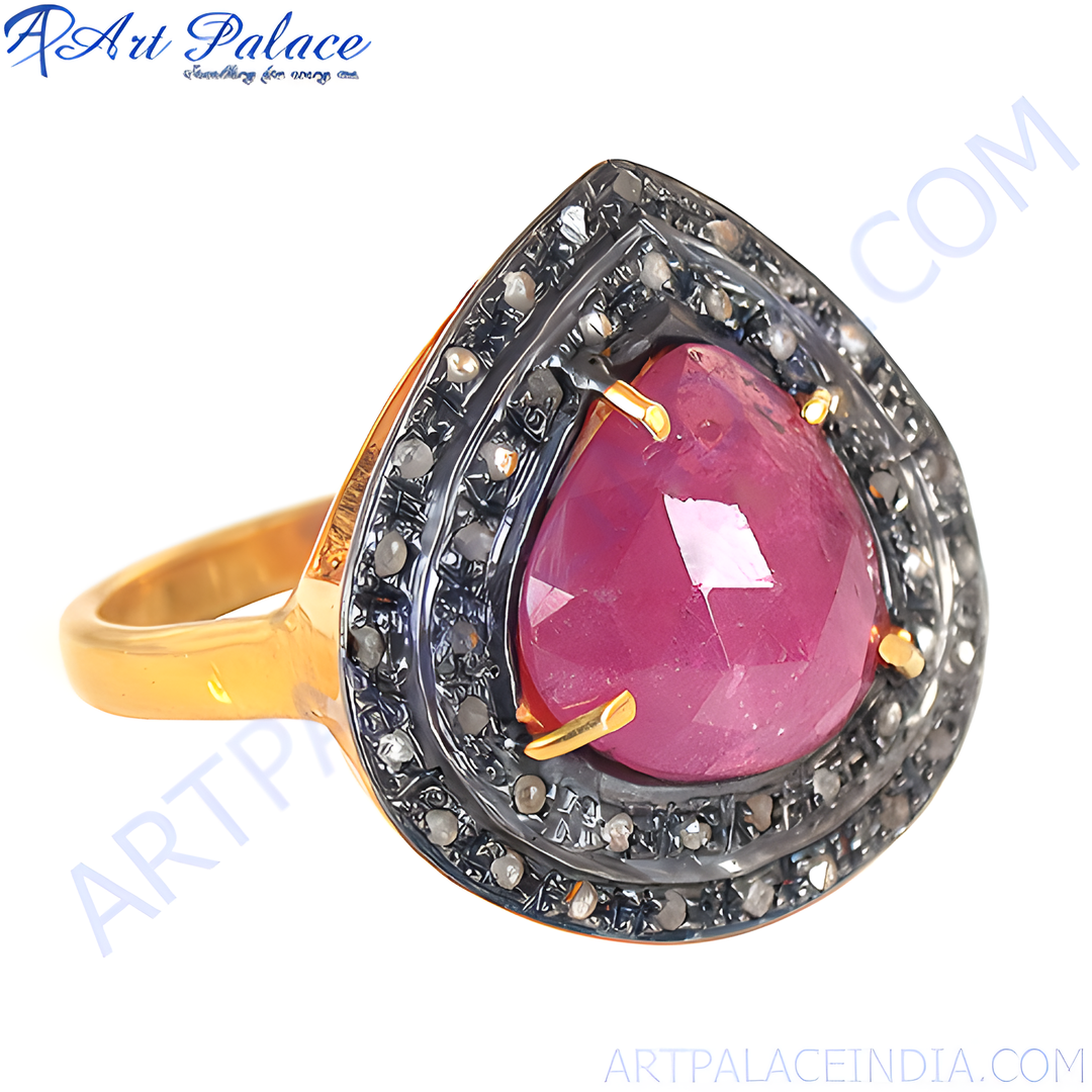 gold plating ruby and diamond ring featuring a pear-cut ruby with a halo of small diamonds, ideal for engagement.