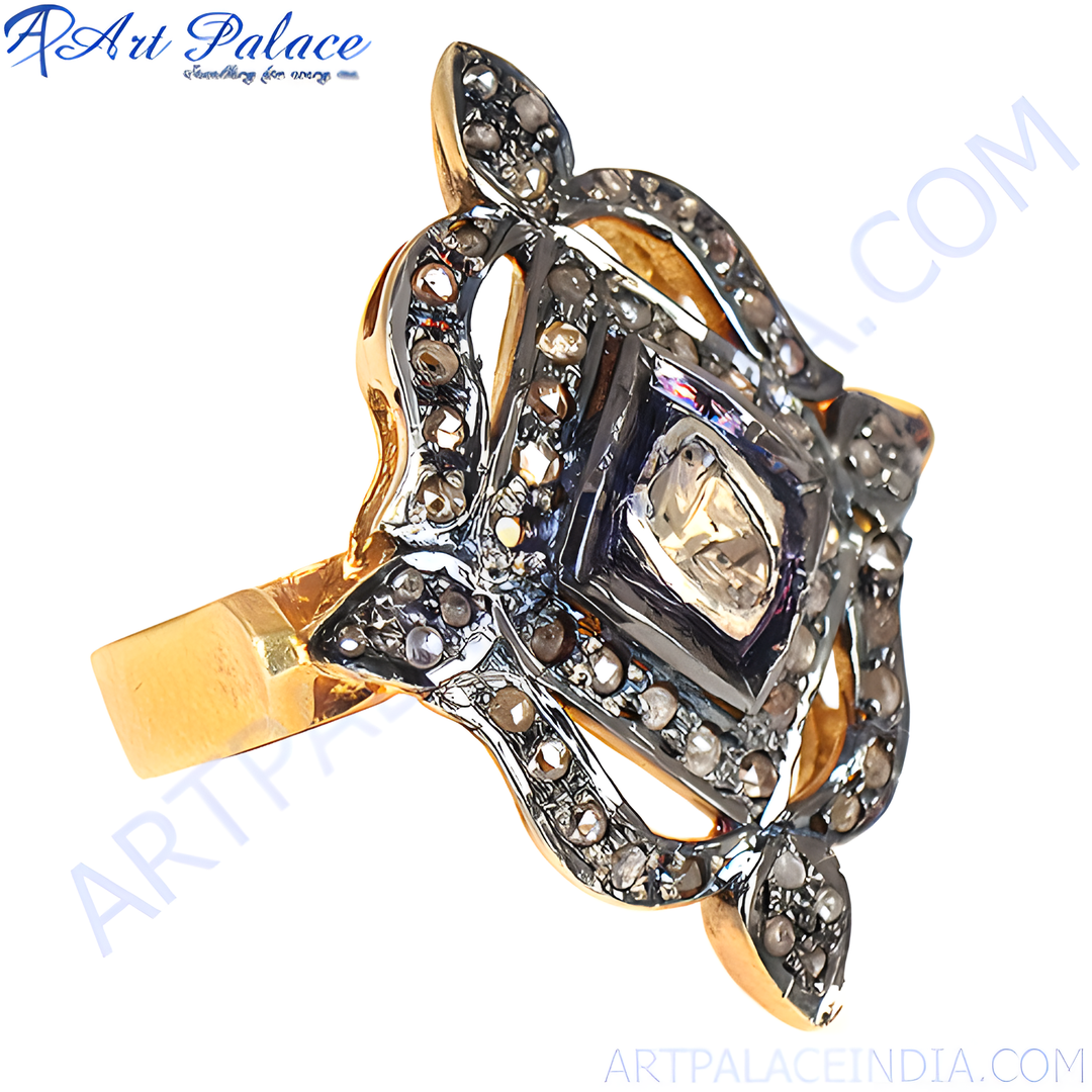 Vintage diamond pave ring in 18k gold. Features intricate detailing and a central diamond accent.