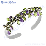 Load image into Gallery viewer, Sterling silver cuff bracelet with amethyst and peridot gemstones in a modern design
