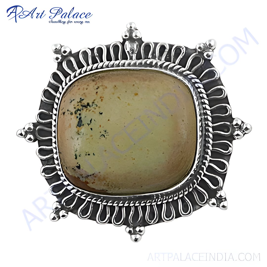 Sterling silver gemstone ring with a large square-cut central stone, a statement piece of jewelry.