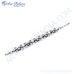 将图像加载到图库查看器中， Sterling silver chain bracelet with flower design, featuring clear cubic zirconia stones.
