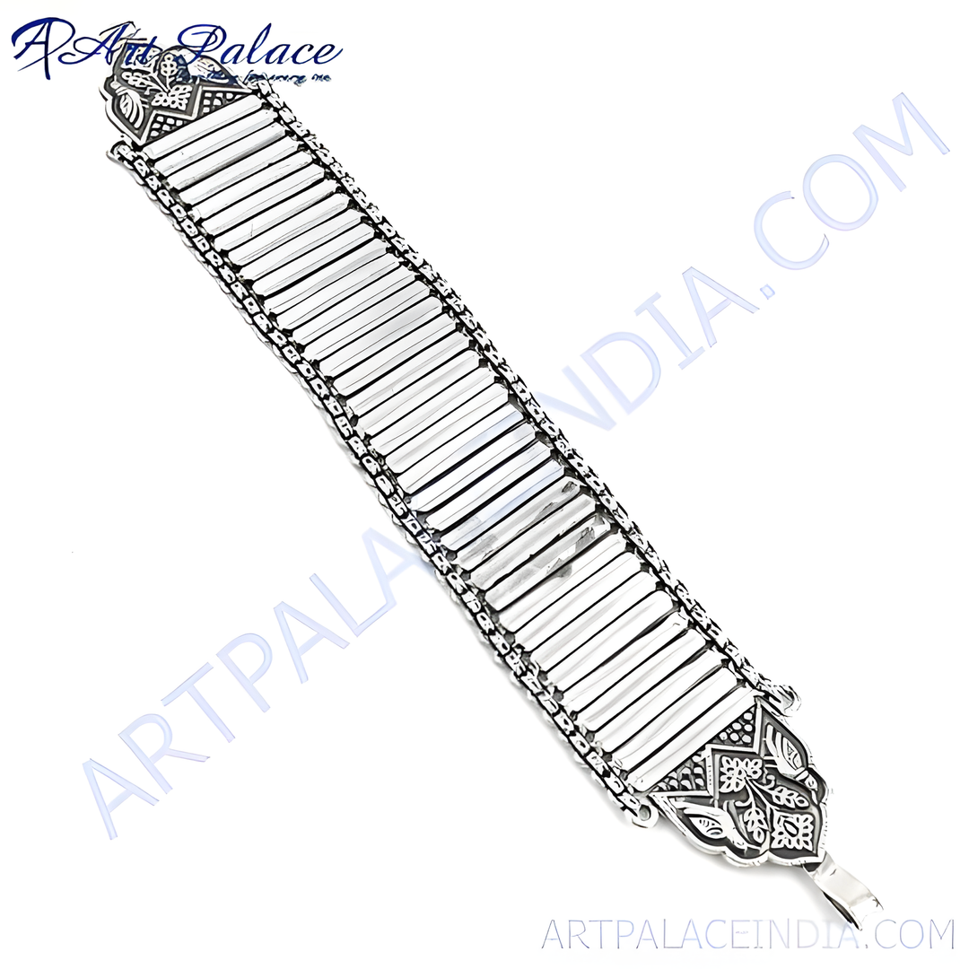 Sterling silver rectangular link chain bracelet with art deco details.